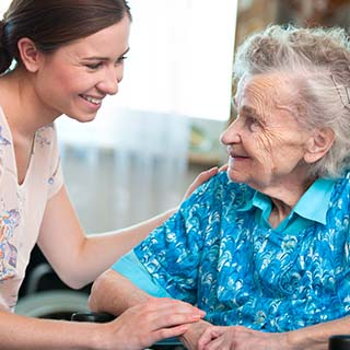 senior woman with home caregiver